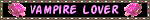 A blinkie with a grey, white and purple border. There is a black background and light purple-ish pink text that says Vampire Lover. On either side of the text, there is a pink rose.