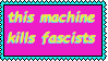 A stamp with a bright magenta-pink background, neon yellow and blue text that reads this machine kills fascists and a bright teal border.