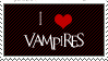 A black stamp with a white border and white text that read I [heart icon] vampires. The heart icon is red.