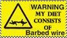 A yellow stamp with a thin black border and black text which reads Warning my diet consists of barbed wire. All the text except for the words barbed wire are in capital letters. On the left of the text there is the outline of a triangle in black with a simple graphic of barbed wire inside.