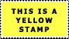 A yellow stamp with a white border and black text which reads this is a yellow stamp in capitalised, bold letters.